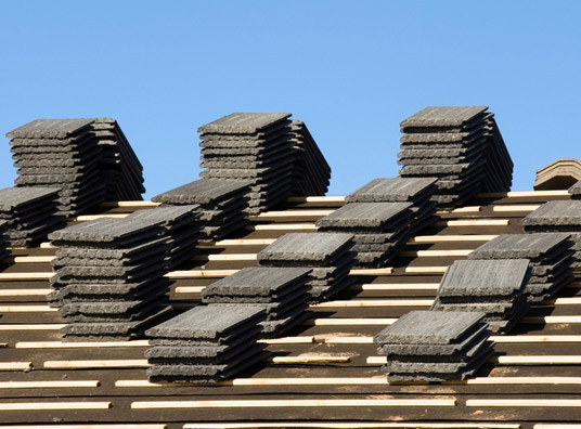Piles of roof shingles