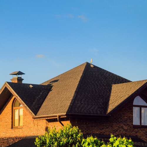 home with an asphalt shingle roof