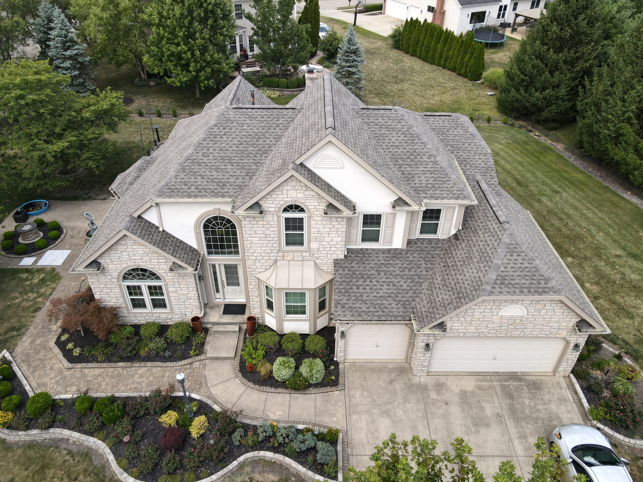 Kerrigan Roofing and Restoration crew completing a roof installation in Centerville, OH