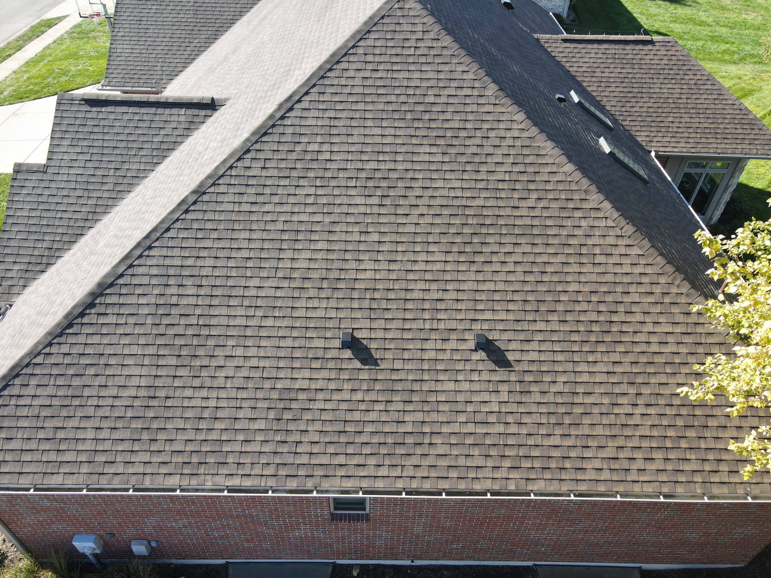 Kerrigan Roofing and Restoration crew completing a roof installation in Centerville, OH
