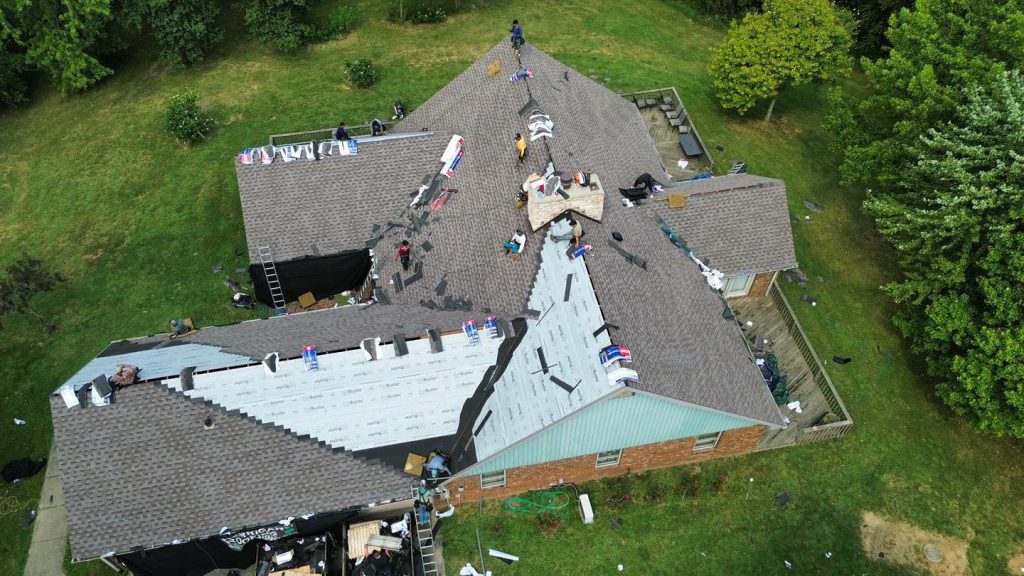 Roof repair and maintenance work in progress