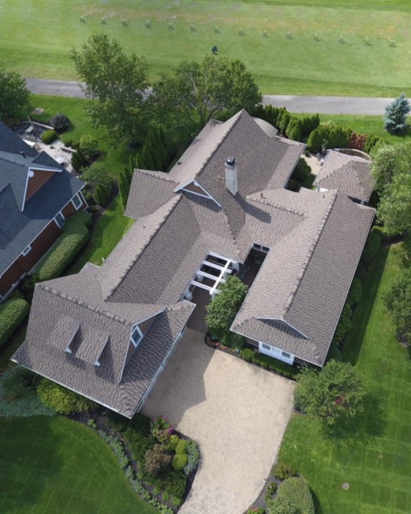 Aerial view of a completed residential roof replacement