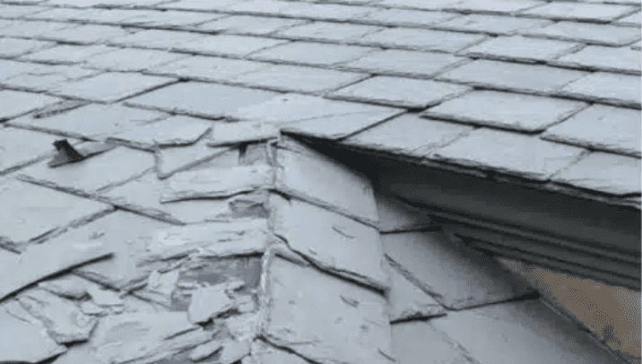 Kerrigan roofer inspecting a composite slate roof