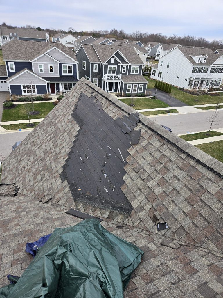 Storm damaged roof awaiting restoration