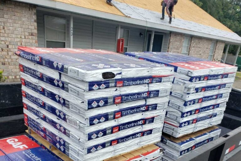 GAF Timberline HD shingle bundles stacked on a roof ready for installation