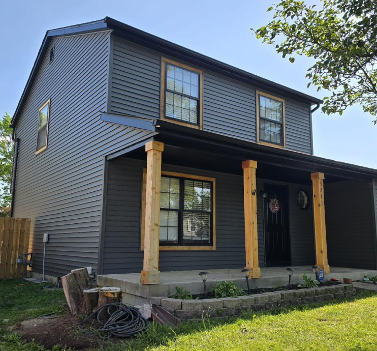 Home fitted with a standing seam metal roof